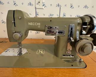 Necchi sewing machine in cabinet