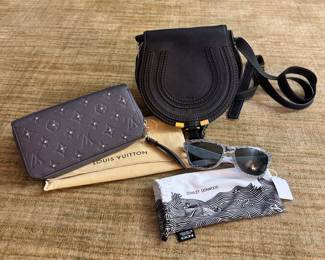 Louis Vuitton wallet, Chloe crossbody and Oakley sunglasses