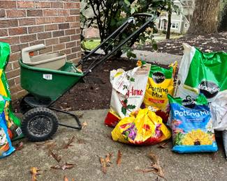 spreader and potting soil