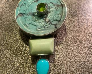 Large carved turquoise/sterling silver pendant