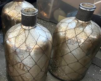 57. Four "Le Soleil Malines" Mercury Glass Bottle 