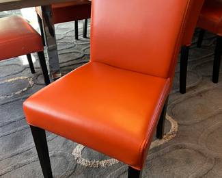 5. Set of 10 Crate + Barrel Faux Leather Dining Chairs in Persimmon (18" x 23" x 34")