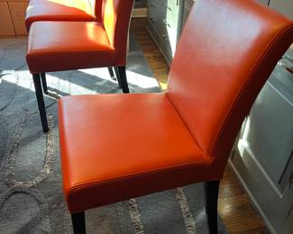 5. Set of 10 Crate + Barrel Faux Leather Dining Chairs in Persimmon (18" x 23" x 34")