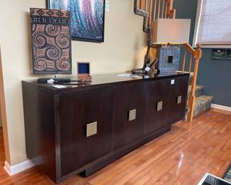 Bernhardt hatten console, Toraja house panel decor, 	Sword letter opener, Table lamps