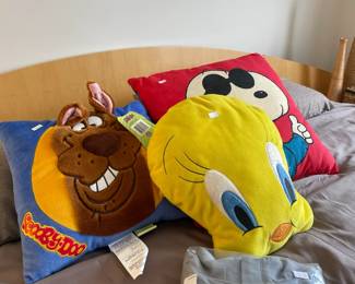 Tweety Bird, Scooby, and Snoopy throw pillows