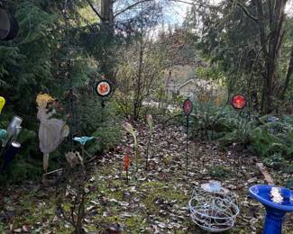 A Variety of Glass and Metal Garden Art