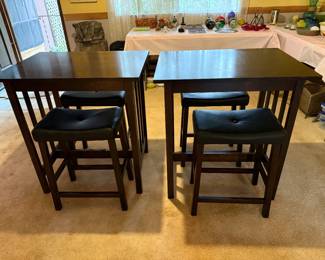 Two sets of Counter Height Tables with stools. Sets Sold Separately. Tables measure 33.3/4in H | 31.1/2in L | 23.1/2in D. Stools measure 23in H | 17.1/2in L | 12in D.