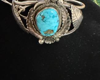$625~VINTAGE NAVAJO STERLING AND HAND CRAFTED ARTIST SIGNED CUFF WITH GORGEOUS DETAIL AND BEAUTIFUL CENTER TURQUOISE STONE.