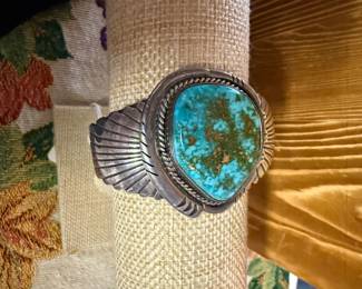 $850~ ARTIST SIGNED STERLING HAND CRAFTED NAVAJO CUFF WITH A BEAUTIFUL LARGE CENTER TURQUOISE STONE