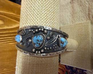 $325- HAND TOOLED STERLING AND TURQUOISE CUFF
