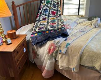 Amish Bed and night stand and so many quilts