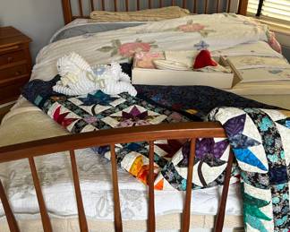 Amish Bed and so many quilts