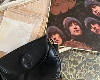 Look at what Louise found Vintage French Linens in the box, Rubber Soul and a Cartier purse