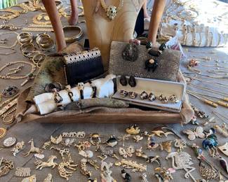 Tons of vintage 50's-80's brooches, bracelets, Necklaces etc.....all new