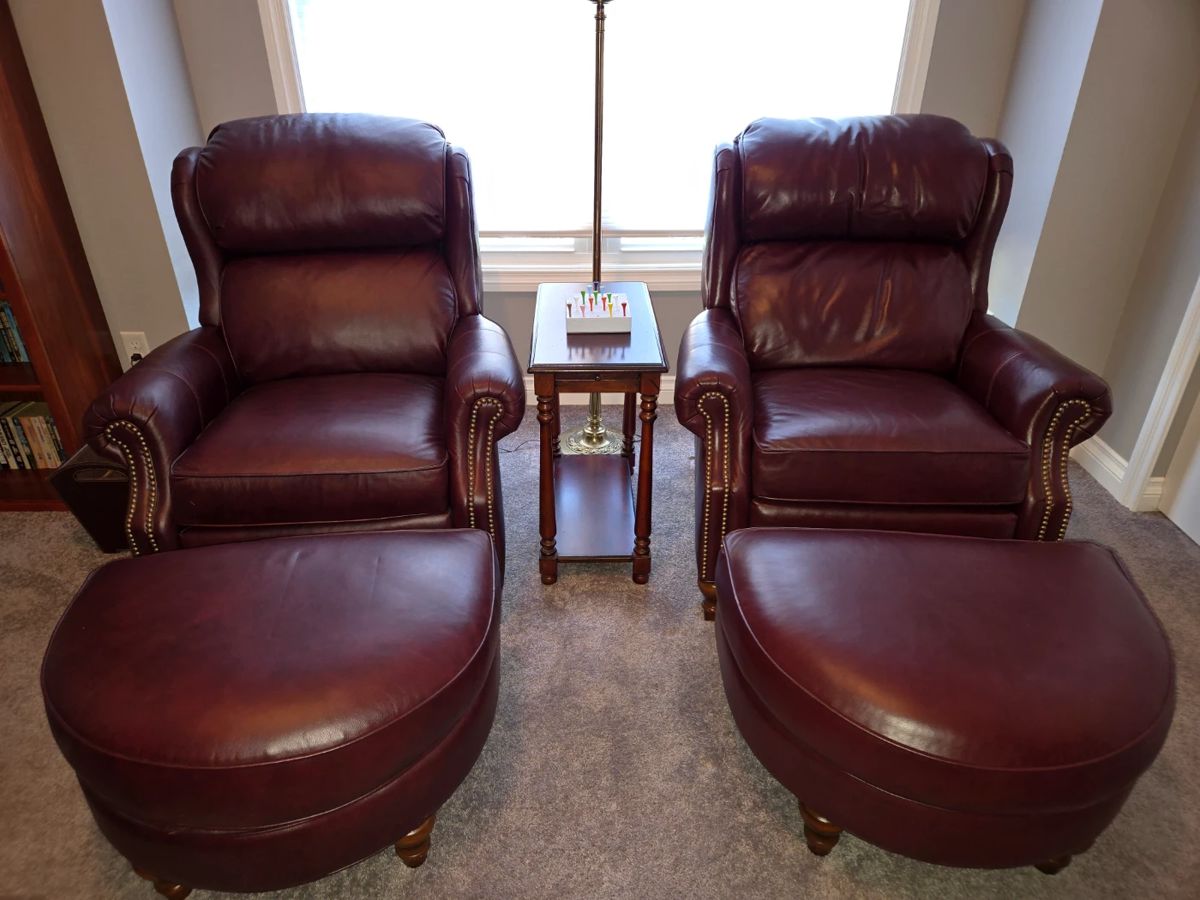 Smith Brothers of Berne leather reclining chairs with ottomans