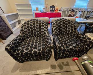Two side chairs, black with ring pattern