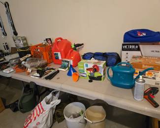 Misc garage - gas cans, watering cans, car stuff