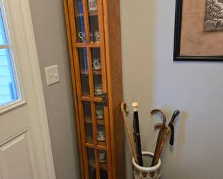 Narrow oak display cabinet