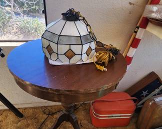 Moghoany occasional table, stain glass lamp, vintage suitcase 