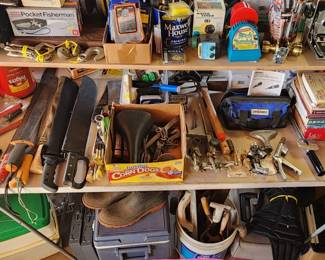 Tools, pocket fisherman, coolers,  machete, car manuals 