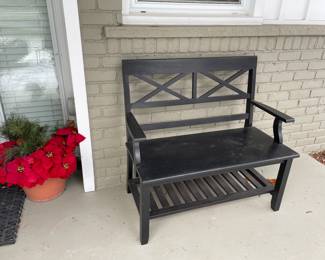 Outdoor bench and faux plant