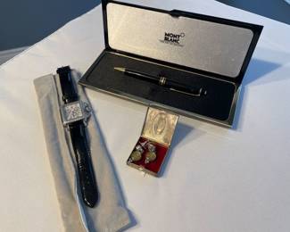 Mont Blanc pen, Angels and Saints earrings, and Michelle Watch