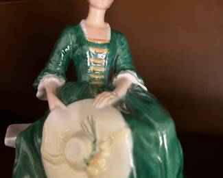 Royal Doulton A Lady From Williamsburg Sitting on Bench