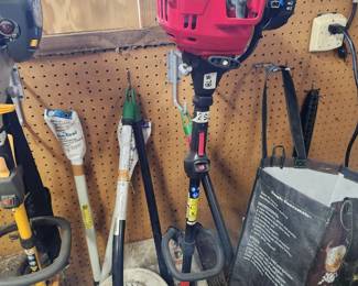 #78	Troy-Bilt 2-cycle TB22Trimmer Plus with tiller and blower attachments	 $25.00 
