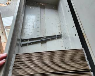 #58	4 Drawer legal size file cabinet on wheels	 $35.00 
