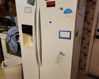 #69	Kenmore Side By Side Refrigerator 106.51762510	 $50.00 

