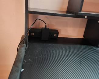 #87	Black L shaped computer desk with working lamp and power outlet metal legs 52x52x29x20	 $125.00 
