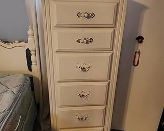 #106	Tall chest of drawers painted white 20x16x52	 $40.00 
