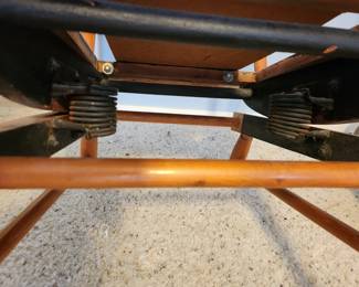 #103	Small vintage wood with metal springs rocker with flora cushions 21" seat length 14" seat height	 $30.00 