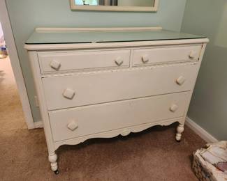 #94	Midcentury Modern Dresser unbranded 4 drawer on wheels painted white with glass top 45x23x36	 $125.00 

