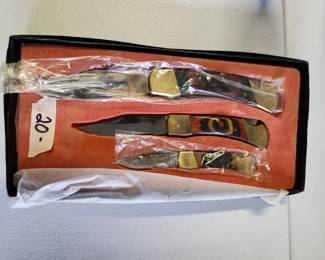 #54	Set of 3 pocket knifes wood handles in a box	 $20.00 
