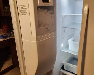#69	Kenmore Side By Side Refrigerator 106.51762510	 $50.00 
