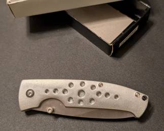 Silver pocket knife with box in like new condition.