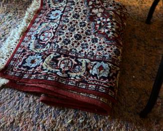 Several antique rugs!