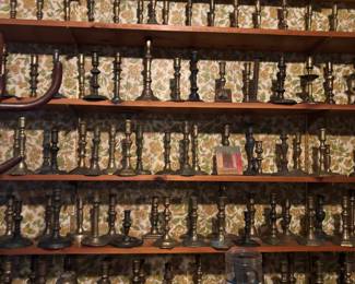 Several hundred brass candlesticks mostly 1800’s