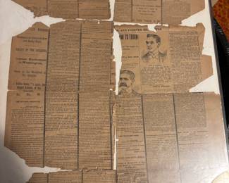 Newspaper announcing the death of President Lincoln’s death. Framed but rough condition