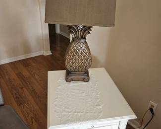 Two matching white country style end tables with pull out shelves. 
$160 both 