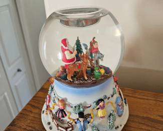 Musical Christmas candle snow globe $20