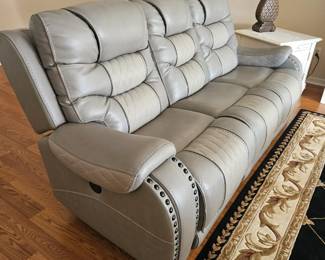 Matching set of electric recliner sofas, separate buttons for reclining the back and adjustable headrest. $2,000 for the pair .
Owner bought the set 2 years ago for close to $4, 900.00