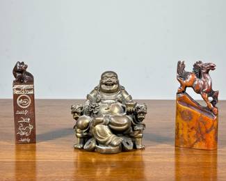 (3pc) Chinese Stamps & Buddha | Including a brass figure depicting Buddha sitting in a dragon armchair, and two carved stone seal stamps, one in a box. - h. 2.5 x w. 2.75 in (Buddha)
