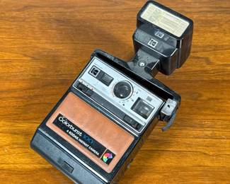 Kodak Instant Camera | Kodak Colorburst 100 instant film camera with flash mount.
