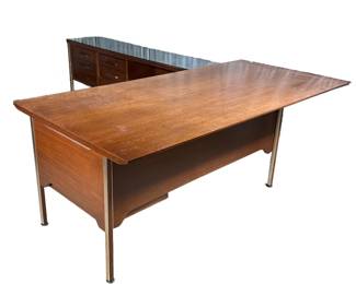 (2pc) MID-CENTURY EXECUTIVE’S CORNER DESK | Mid-century modern desk and sideboard extension, in two pieces, including an executive desk height 29 by length 76 by depth 36 plus a matching extension with a bank of six drawers, height 27 length 74 depth 16.