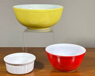 (3pc) Vintage Pyrex Bowls | Including Pyrex red and yellow mixing bowls, smaller dia. 7.25 in, and a Corning Ware ramekin. - h. 4.5 x dia. 10.25 in (larger bowl)
