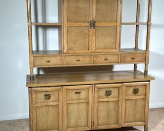 Mid-century Cabinet Etagere | Sideboard / China cabinet with an upper section of open shelves flanking double cabinet doors over three drawers, all over a lower section with double bi-fold cabinet doors, light wood with brass pulls and mounts. - h. 63.25 x l. 54 x d. 17 in

