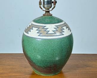 SOUTHWEST POTTERY STYLE CERAMIC LAMP | 
Green glazed ceramic with Southwestern geometric pattern around the rim. -  h. 17 in