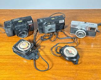 (5pc) Film Cameras & Meters | 35mm film cameras including a Nikeon Tele Touch camera, a Kodak VR 35, and an Olympus Quickmatic, plus a G&E light meter and a Dejur USA light meter.
